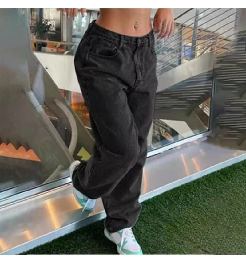 Model wearing Y2K Retro Loose Jeans with a stylish casual vibe indoors.