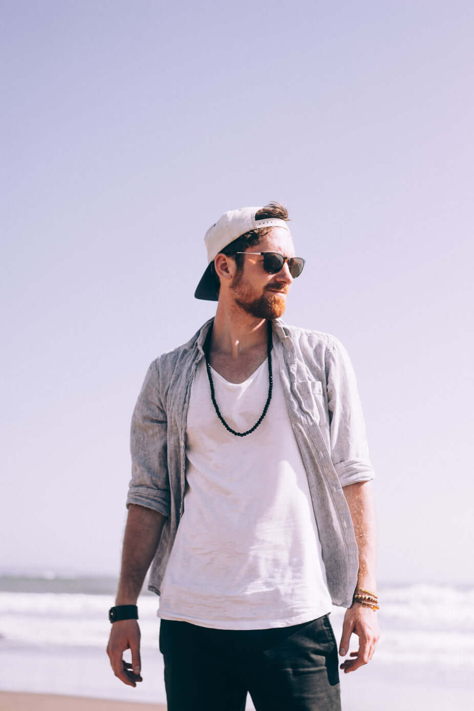 casually-dressed-man-at-the-beach