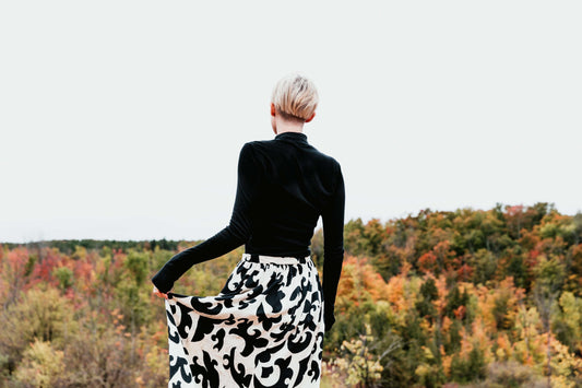 woman dressing up on black and white for fall season