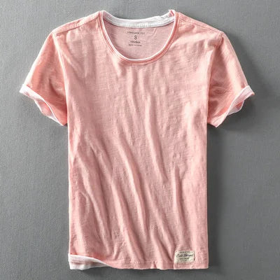 Pink t-shirt on a gray background
