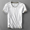 White t-shirt on a gray background