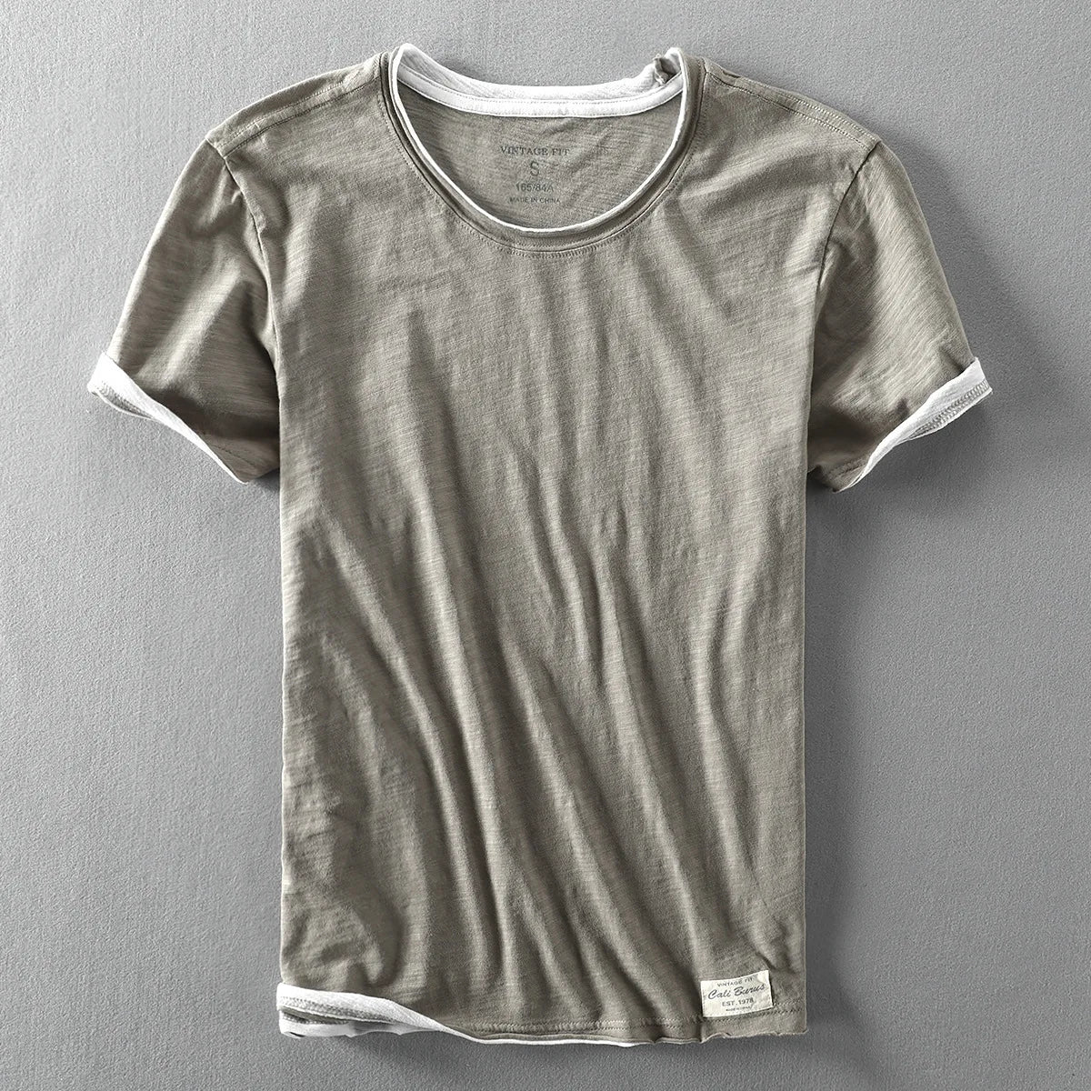 Gray t-shirt on a gray background