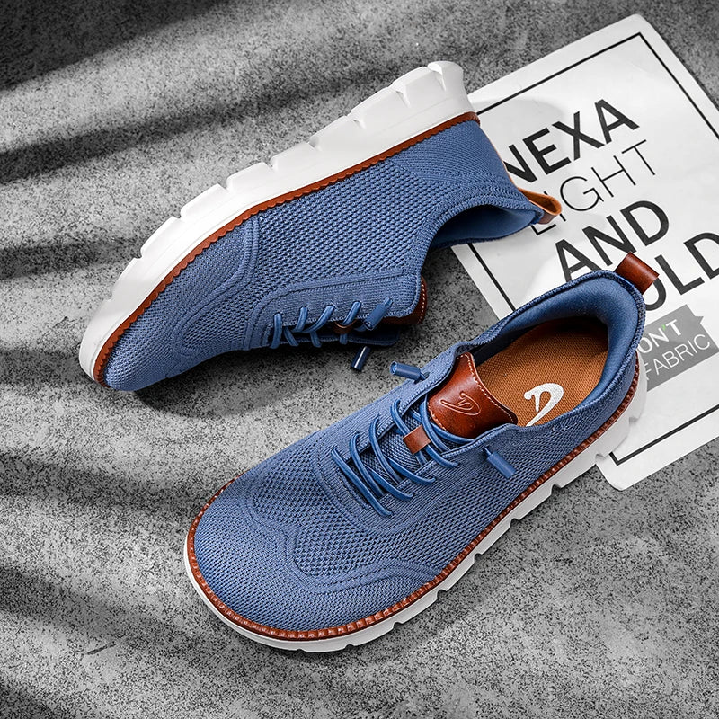 Blue sneakers with brown accents on a textured surface