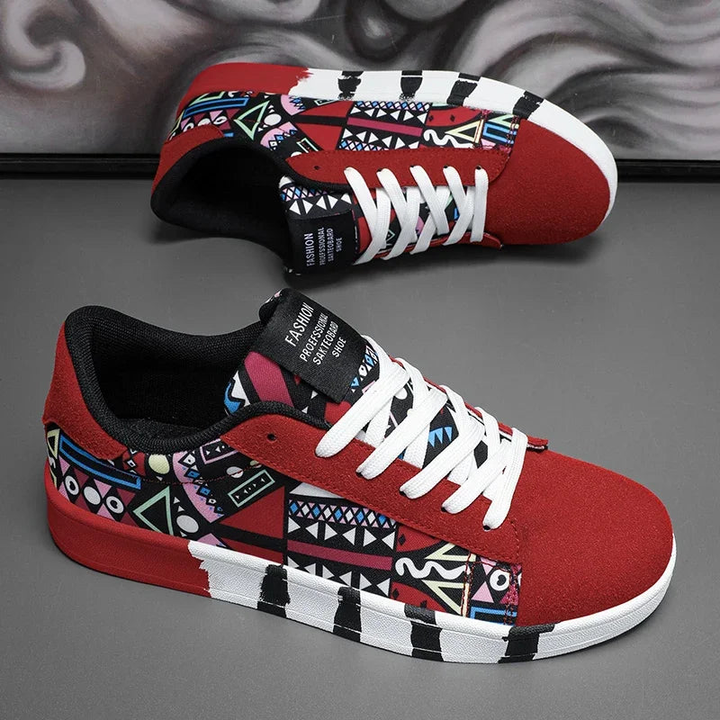 Red sneakers with geometric pattern on a gray surface