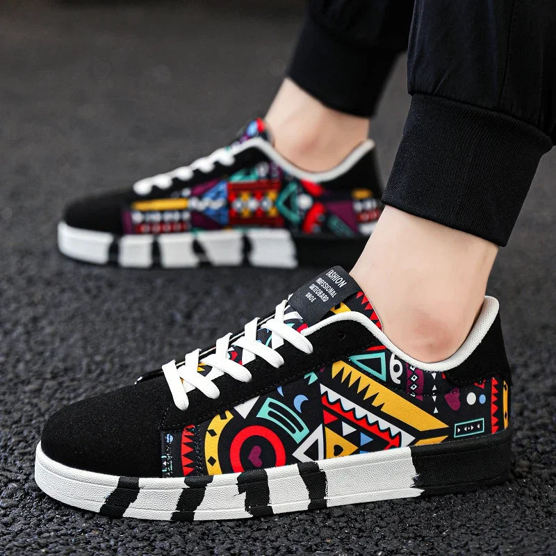 Colorful patterned sneakers worn on a dark surface