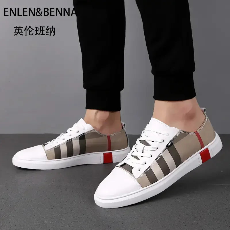 White sneakers with striped pattern worn by a person on a gray background, featuring the brand 'ENLEN&BENNA'.