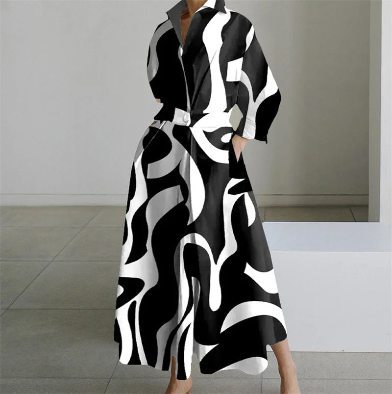 Black and white patterned dress worn by a person in an indoor setting